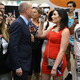 Loomer, in red, yells at fameball lawyer Michael Avenatti at Politicon, October 20, 2018, because everything is dumber than we could have possibly ever imagined.